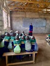 Pupils with their new teacher