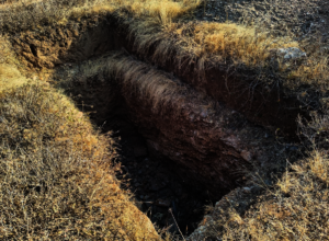 One of two new latrine pits - freshly dug