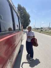 Ana outside the minivan