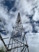 Climbing the radio tower for maintenance