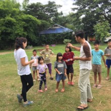 Finn and volunteer teach our youngest English