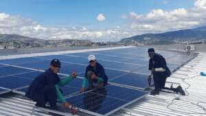 Boys learning how to install solar panels,Honduras