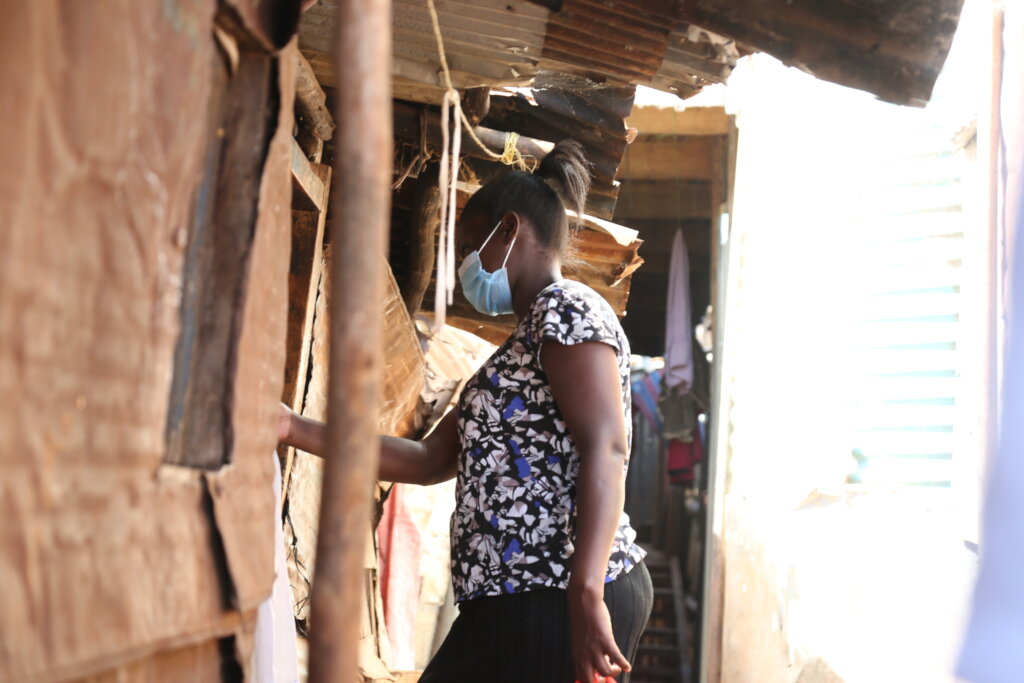 Quinter, a CHV, working in Kibera