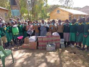 CFK distributing dignity kits to girls.