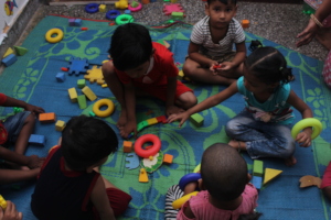 Aanganwadi children identifying colours