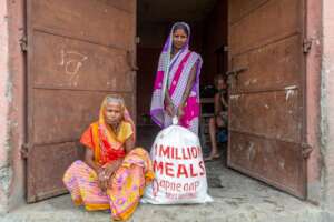 Beneficiaries with ration kits