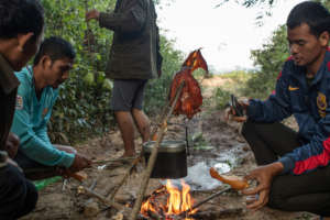 Roveang station rangers cook after a day of patrol