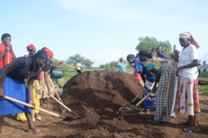 Women from Ngaraaf making compost