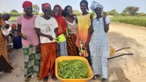 Women in Ngaraaf with their Harvest