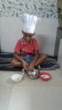 Hamza displaying his culinary skills