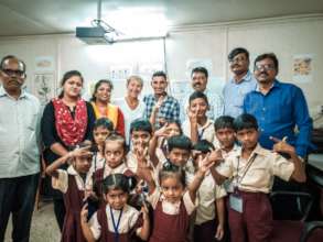 OSCAR delivers laptops for deaf children