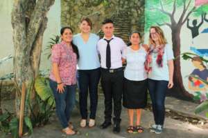 OYE staff w/ high school grad and his proud mother