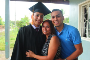 Amilcar with family on Graduation Day