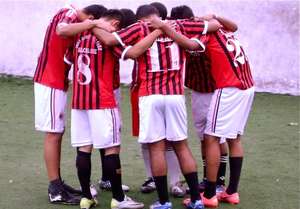 COPA OYE kids huddling