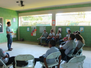 Angel engaging students in masculinity workshop.