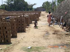 children stay with their parents in brick chamber