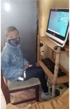 Jordy and his new computer ready for class