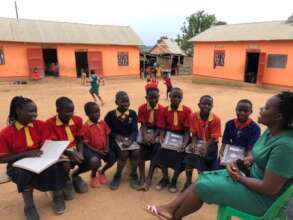 Justine (plaited hair) with other school children