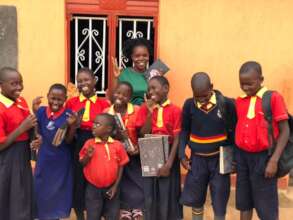 Cosma primary school children with their teacher