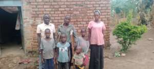 Executive Director of Cosma with J Bosco's family