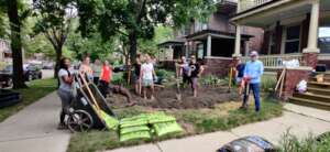 Volunteers hard at work installing a Rain Garden