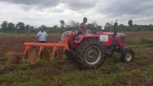 Inspecting a ploughing of a demostration farm