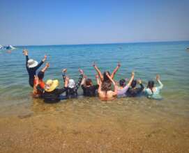 Women visiting the seaside during a PSS session