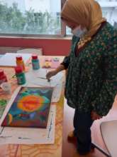Painting class led by Nesma, the Art Teacher