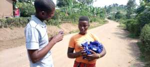 One of the girl in refugee recieve pads