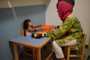 Child taking an occupational therapy session