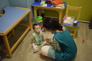 Child taking a speech therapy session