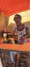 Sarah in her sewing stall