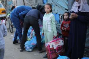 A PKU patient receiving a blanket and parcel