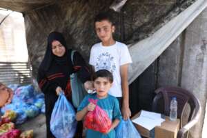 13-year-old Yassin and his younger brother Tareq