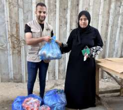 Ali and Alia's mother receiving a parcel