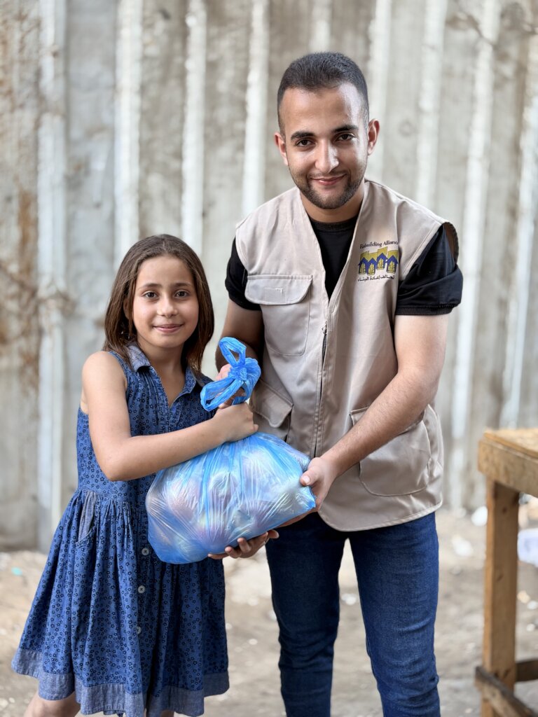Islam with her parcel