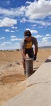 Taking a water sample from a water source