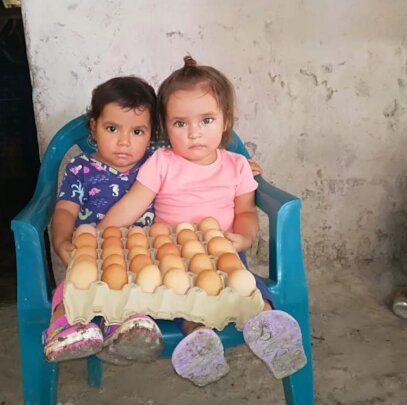 Children receiving their eggs