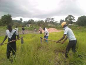 women preparing a fish pond