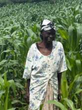 a happy widow in her farm of corn