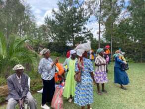 widows receiving their farm inputs