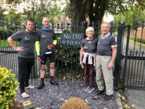 Martin, Micheal and parents at finish line