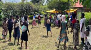 Young Mothers Enjoying a Game of Frisbee