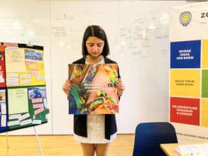 Mary showing a motivational poster.