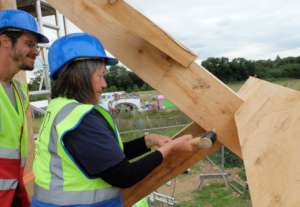Wendy (Andover Trees) knocks in the final peg