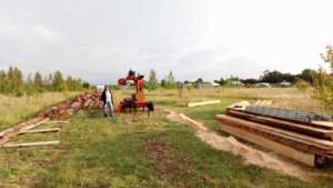 Milling machine transforms the remaining logs