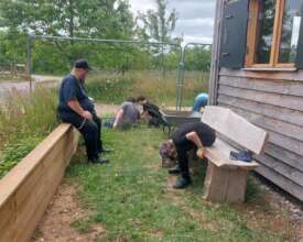 Student volunteers help to keep things tidy