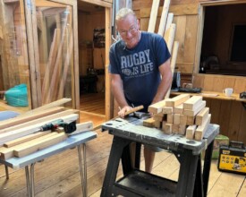 Volunteer carpenter Pete works on new fittings