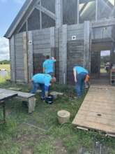 Cabin walls get a good wash down