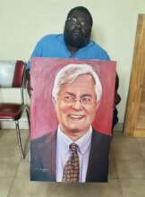 Samuel with the painting of Ken